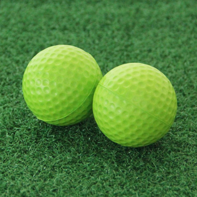 Foam golf practice balls UK — two green lightweight PU sponge golf practice balls
