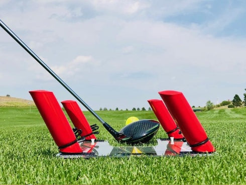 Golf swing mirror UK — portable training aid in use on the course