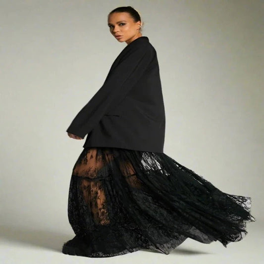 Woman showcasing Mueyeruho 2024 black high waist flare ankle-length skirt with lace detail, paired with a chic blazer.