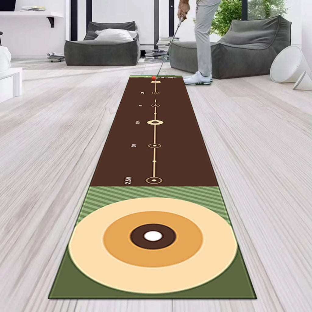 Golf practice mat on a wooden floor with a person holding a golf club.