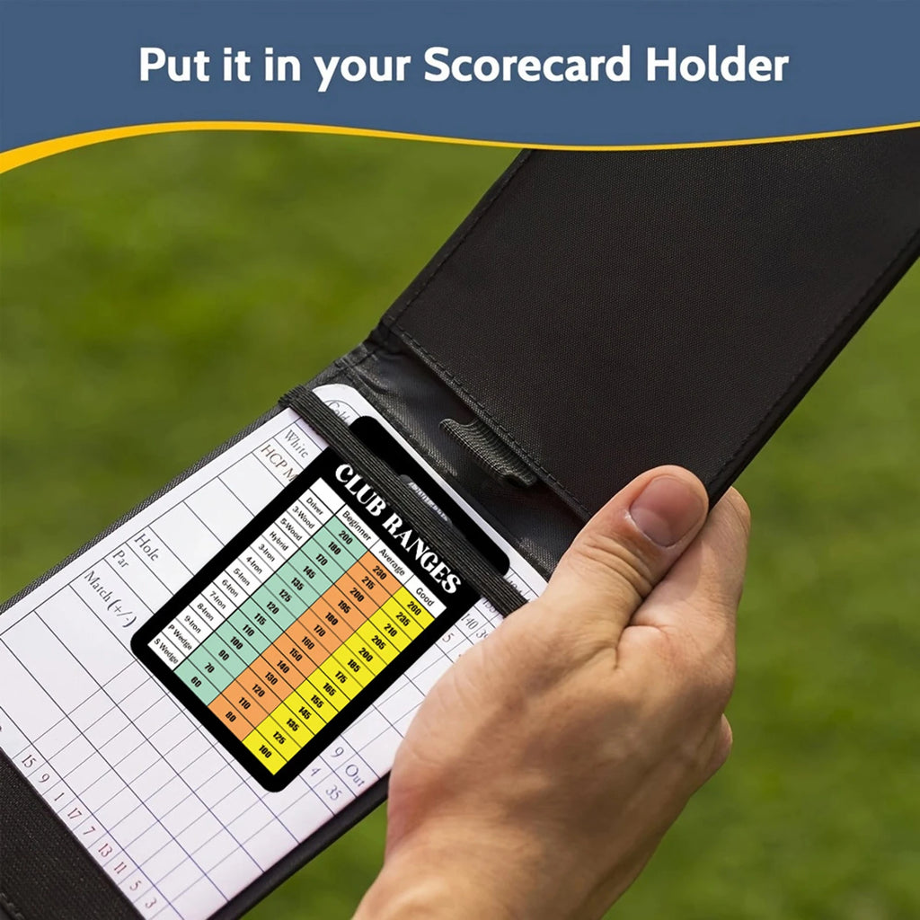 Hand holding a scorecard holder with a golf club range chart on a blurred green background