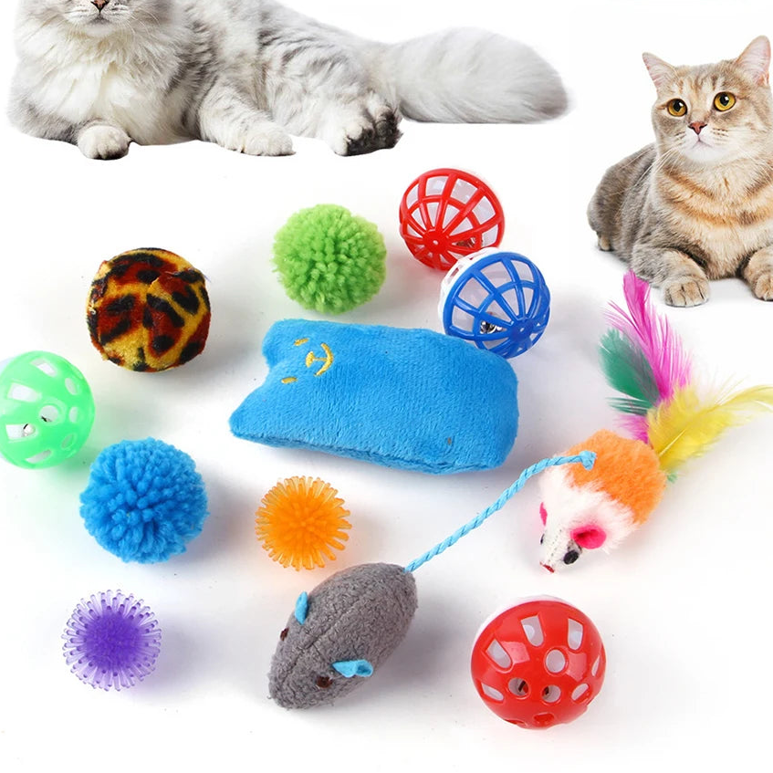 Assorted cat toys with two cats on a white background, labeled as a 12-pack.