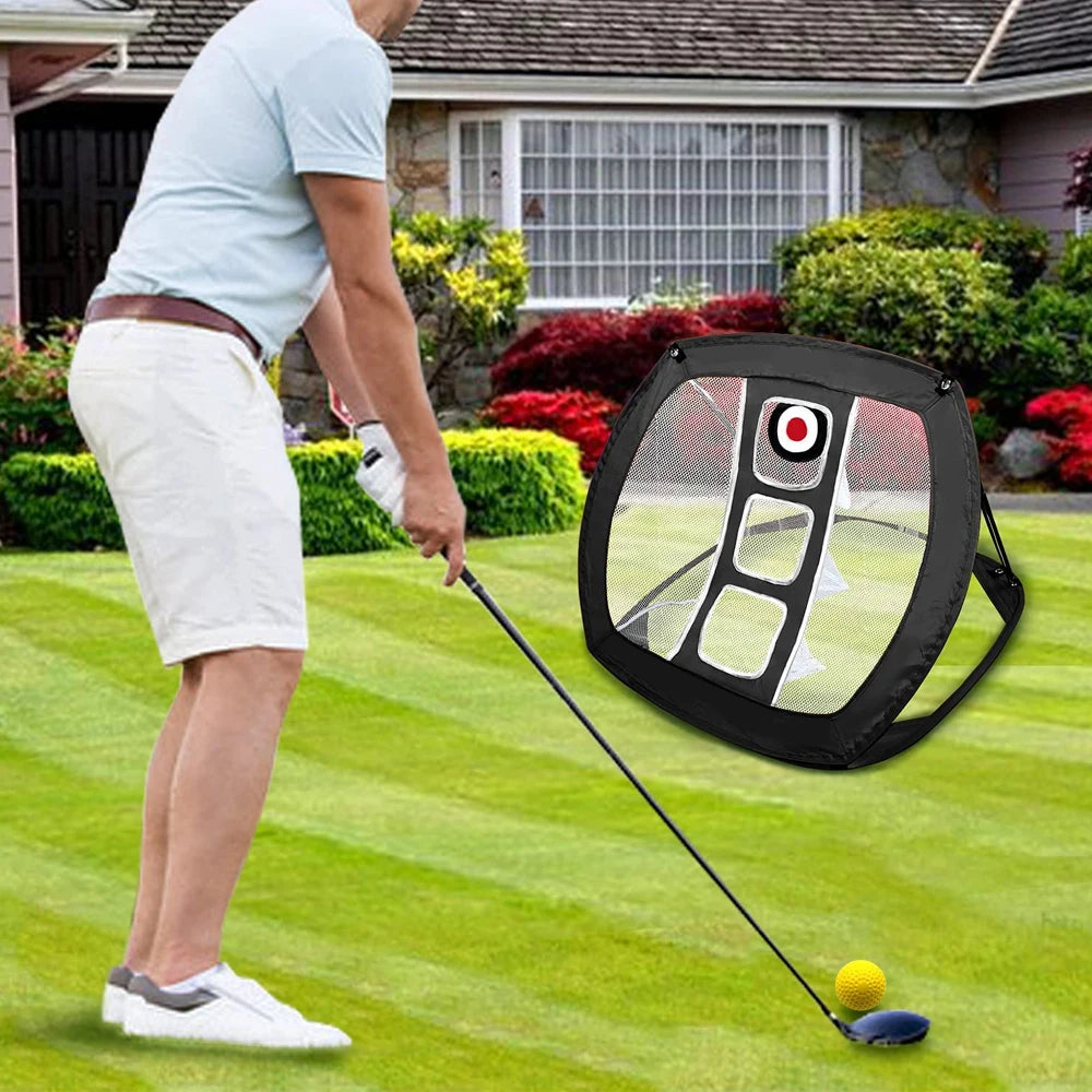 Person practicing golf swings with a target practice device on a grassy area.