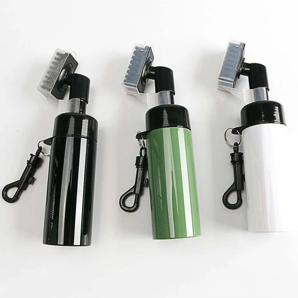 Three cleaning brushes with black, green, and white handles on a white background