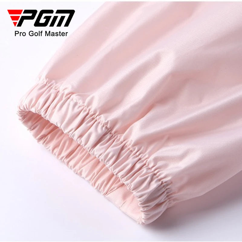 Close-up of pink golf pants with Pro Golf Master logo on a white background
