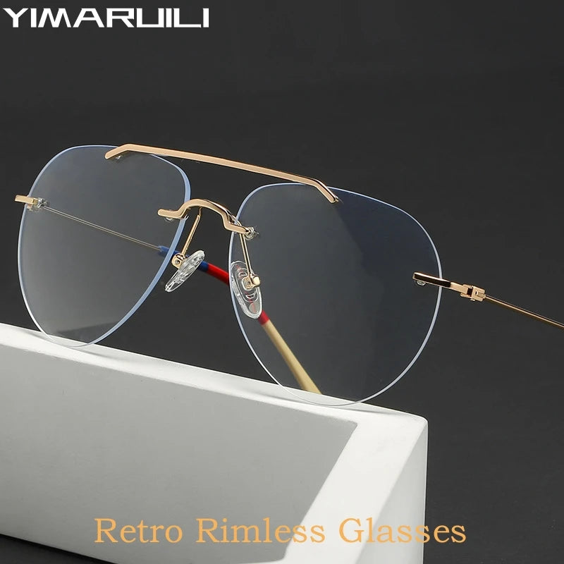 Retro rimless glasses with gold frame on a dark background, featuring the brand 'YIMARUILI'.