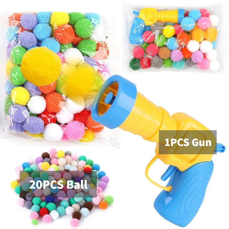 Colorful toy gun with packs of multicolored balls on a white background
