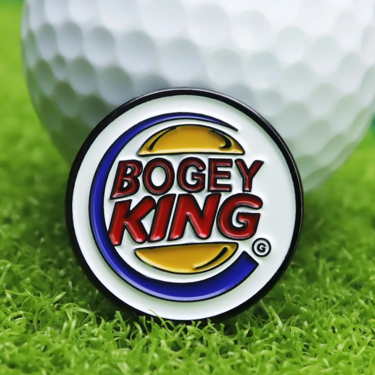 angry golfer novelty ball marker set on green background