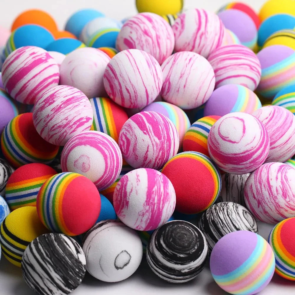 Colorful foam golf balls UK - marbled and striped balls on a white background