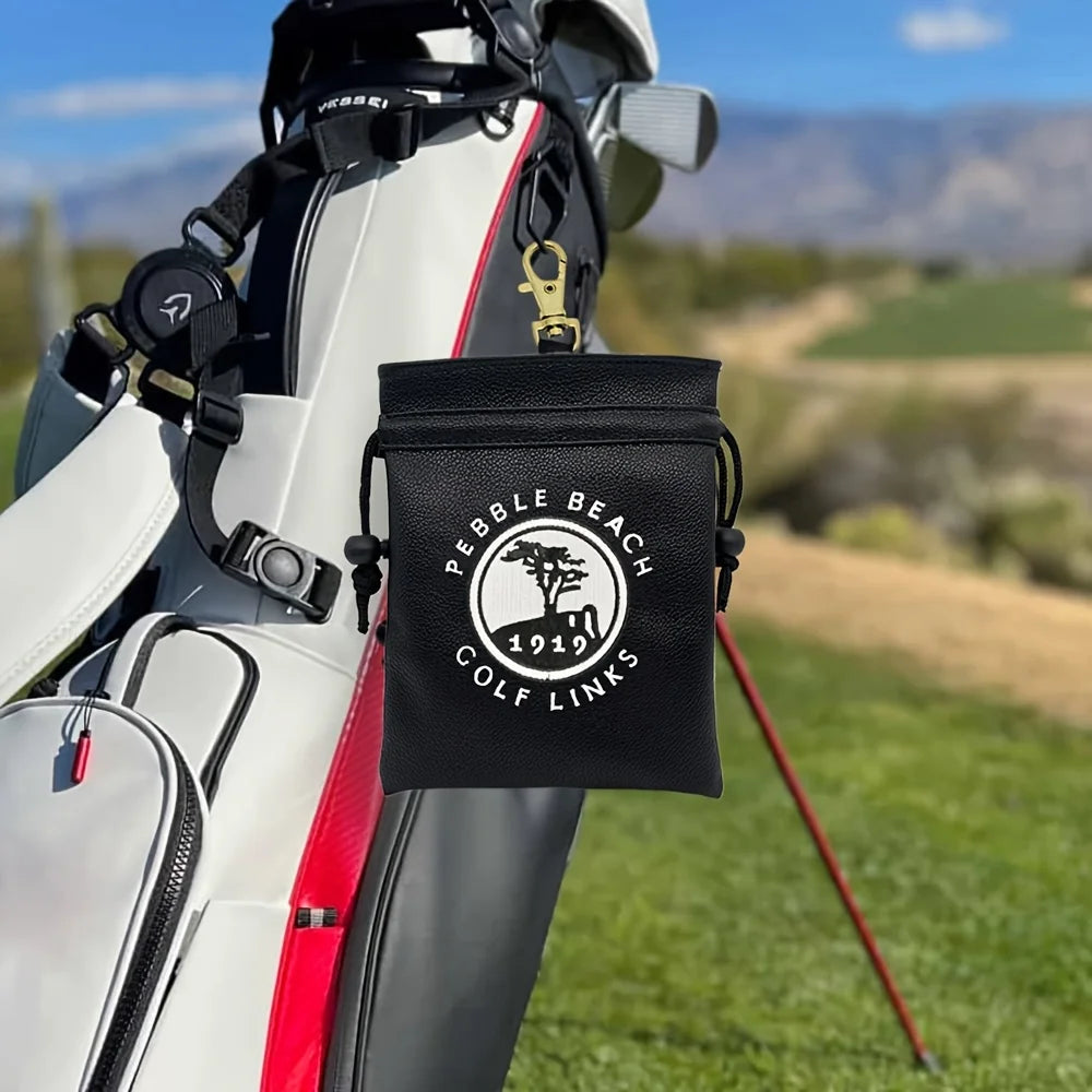 Golf ball bag UK — drawstring ball pouch in use on the golf course
