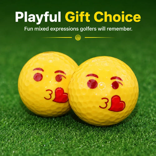 
funny emoji golf balls -
Two yellow golf balls with red and black emoji-style faces kissing hearts, placed on green artificial turf with promotional text above reading 'Playful Gift Choice' and 'Fun mixed expressions golfers will remember.'.