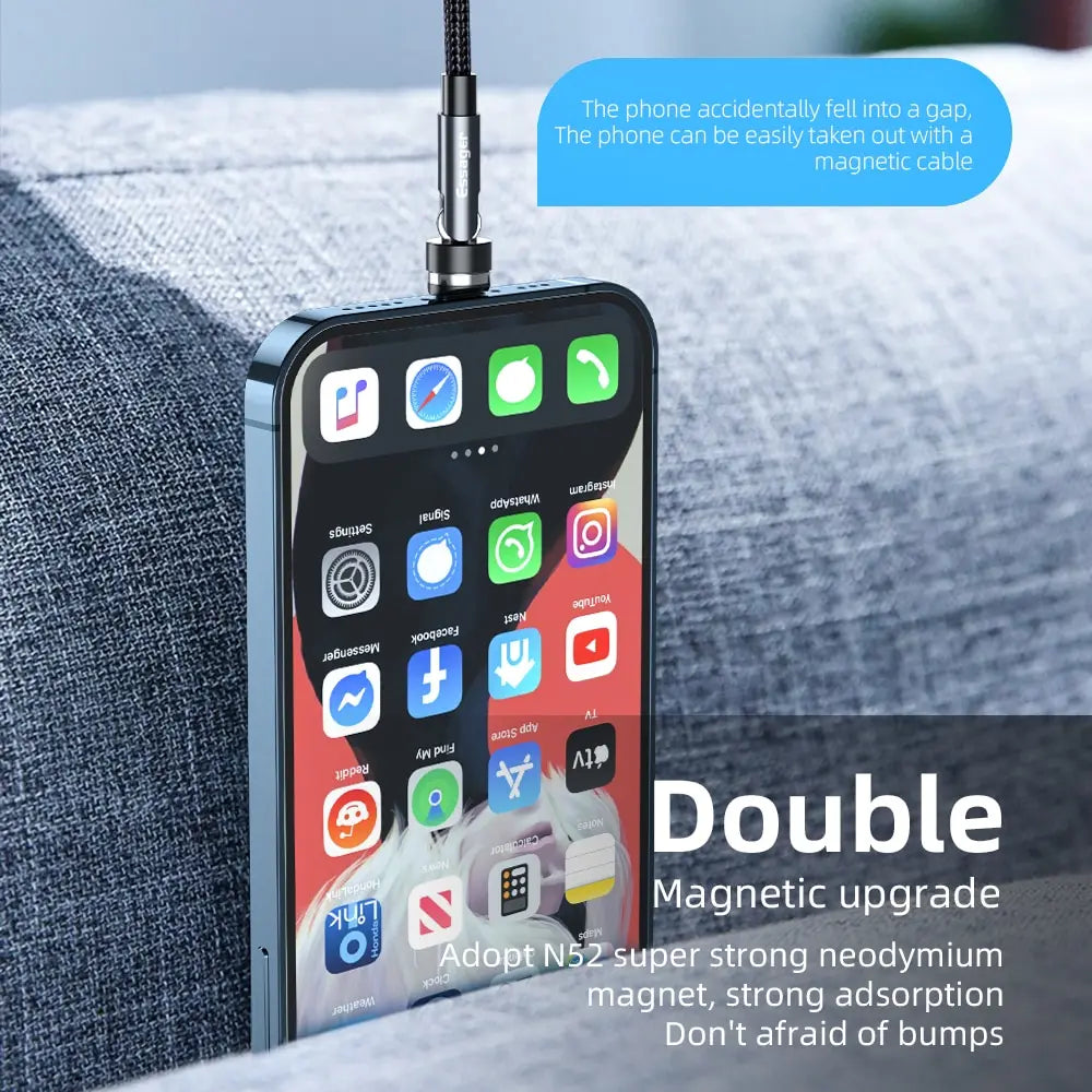 Smartphone with magnetic cable on a couch, highlighting phone's screen and features.