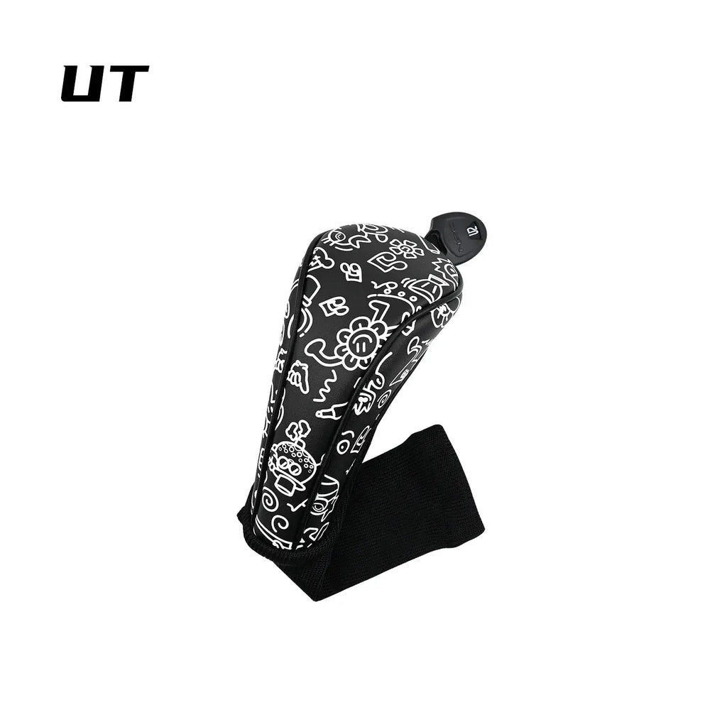 golf club head covers Uk black with a white graffiti-style pattern, shown on a plain white background with a black 'UT' logo in the top-left corner.