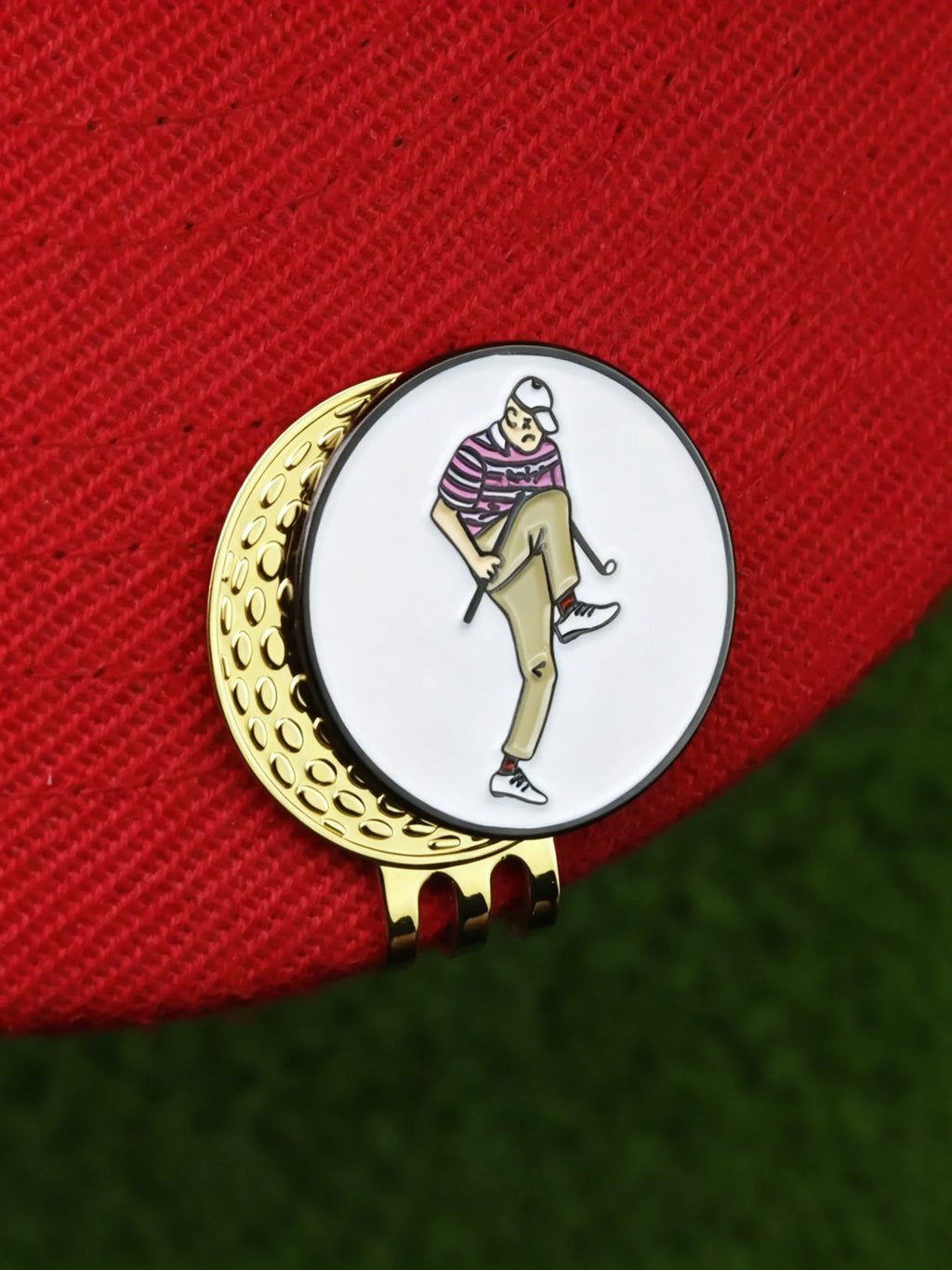 angry golfer ball marker red background front view