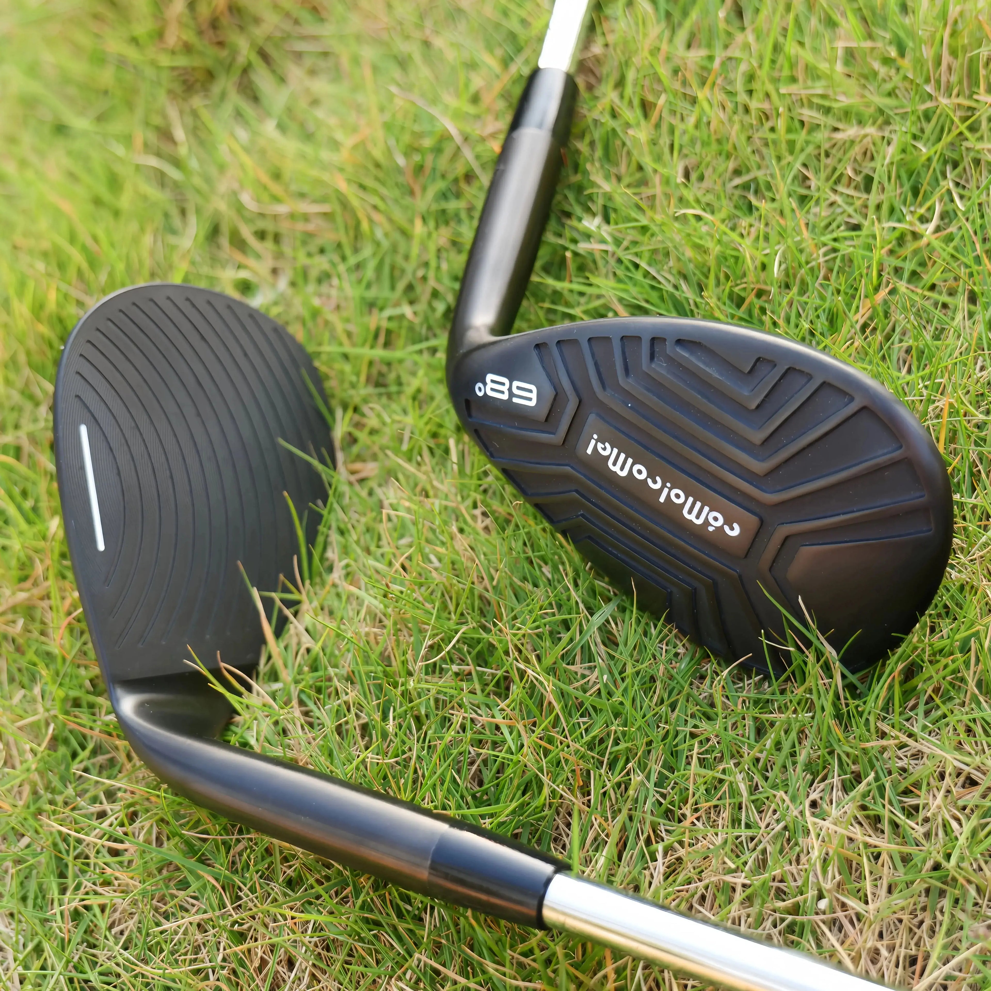 high loft golf wedge UK - Golf club on grass with visible branding