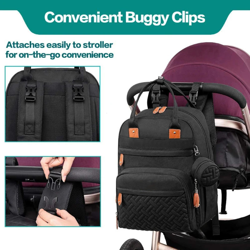 Black backpack with convenient buggy clips attached to a stroller, with text highlighting features.