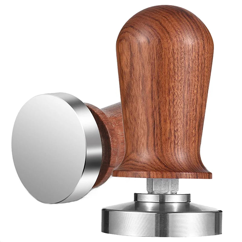 Wooden handle coffee tamp with metal base on a white background
