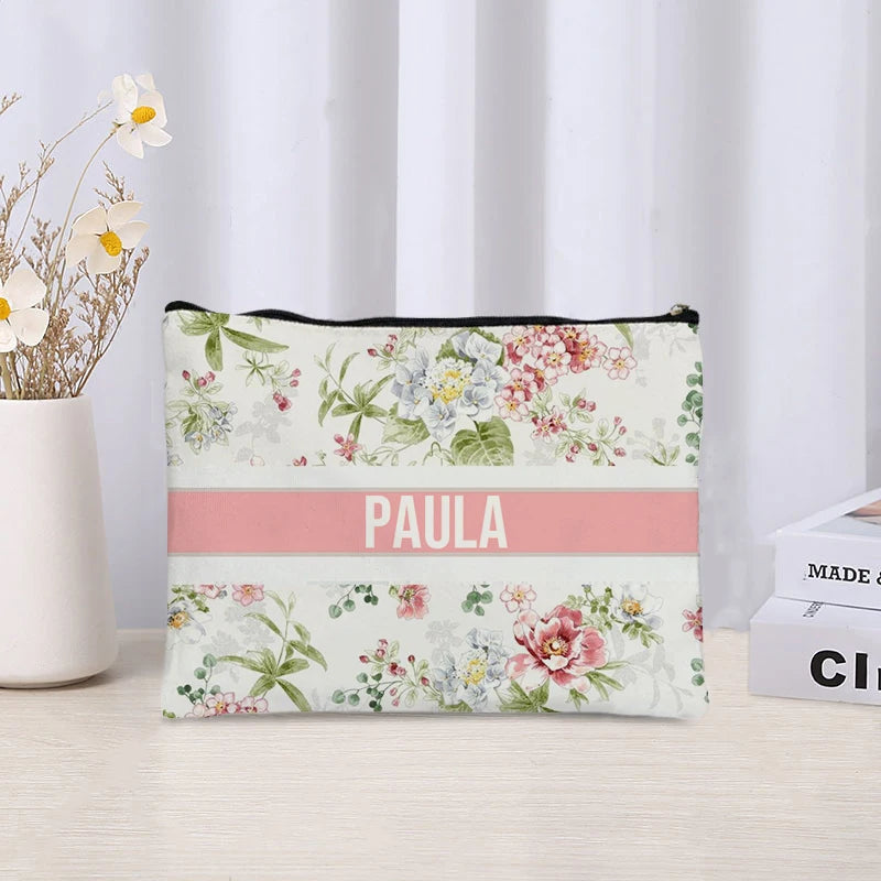 Floral patterned pouch with 'Paula' on a light background