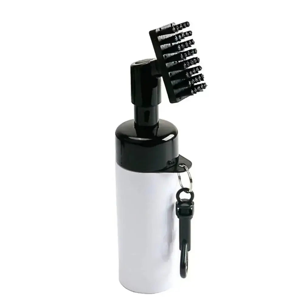 Golf club cleaner UK - White bottle with black cap and bristle brush on a white background