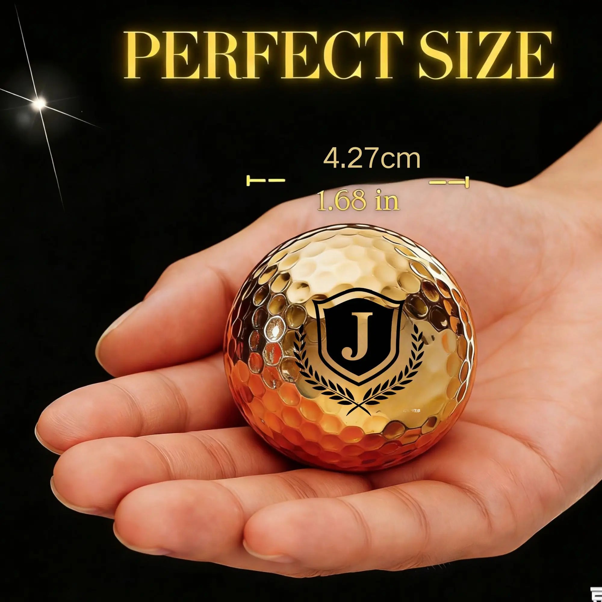 Gold golf ball with a logo held in a hand, labeled 'Perfect Size' with measurements.