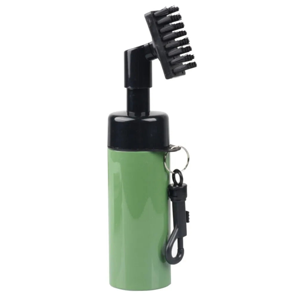 Green cleaning brush with black bristles on a white background