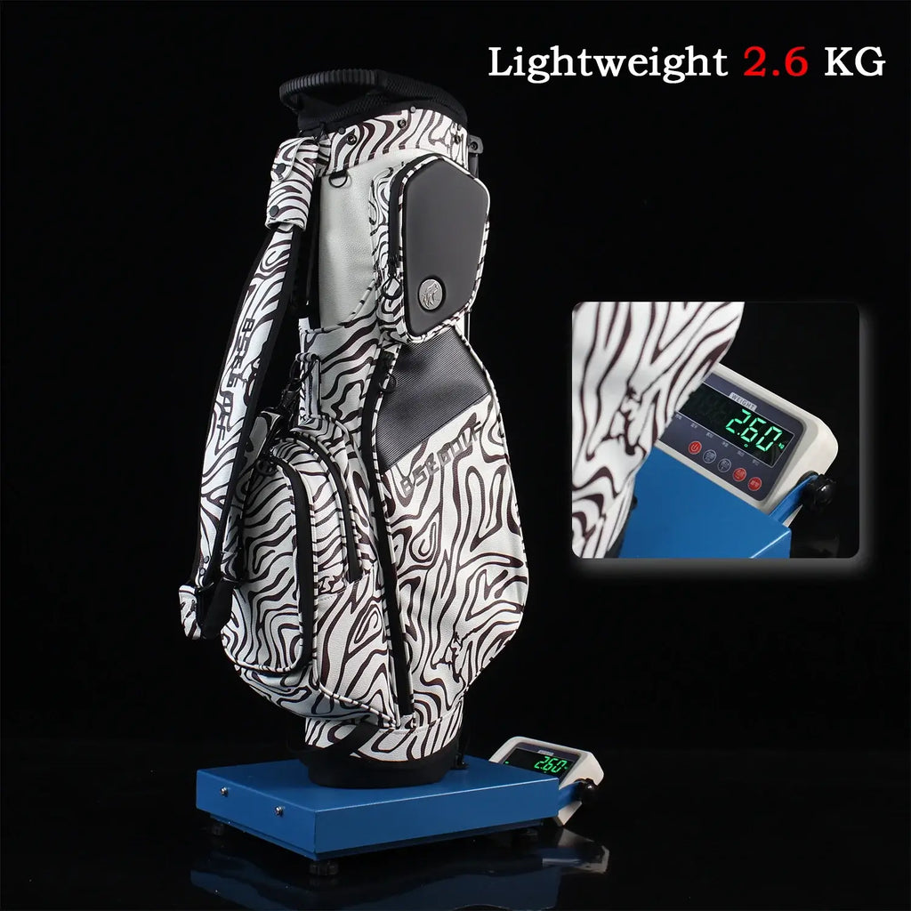 Golf bag with zebra pattern on a scale displaying weight 2.6 KG, against a black background.