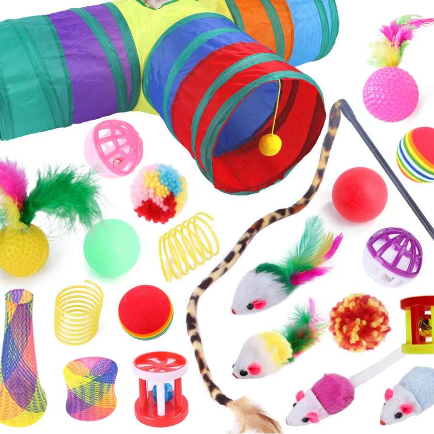 Colorful cat toy tunnel with various cat toys on a white background