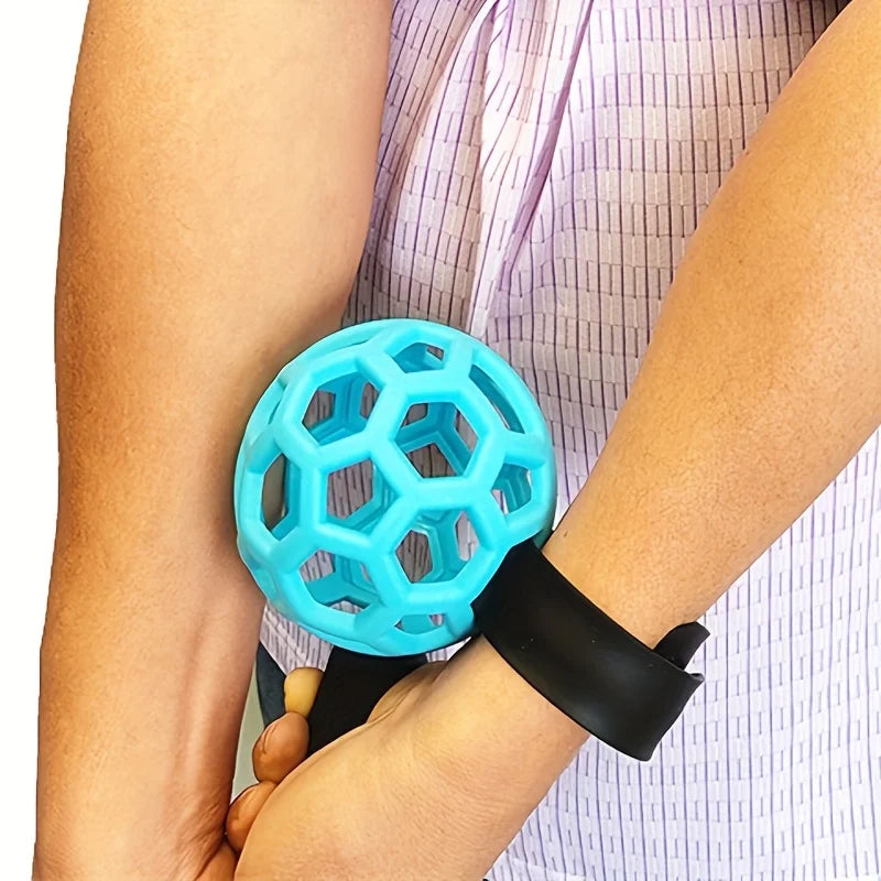 golf swing trainer UK - Person wearing a blue massage ball on their wrist with a white background