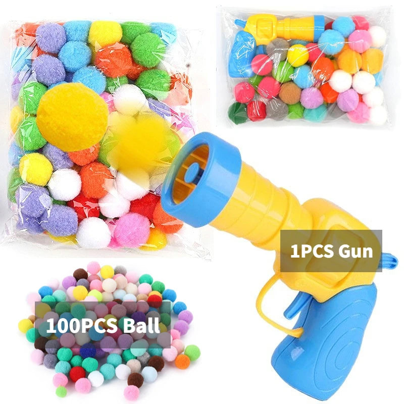 Colorful ball gun with bags of multicolored balls on a white background