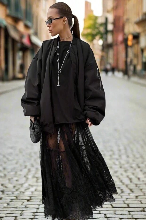 A model wearing the Mueyeruho 2024 Spring Summer Solid High Waist Flare Long Skirt for Women.