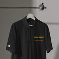 Black polo shirt with 'Irish Army' text on a hanger against a gray background