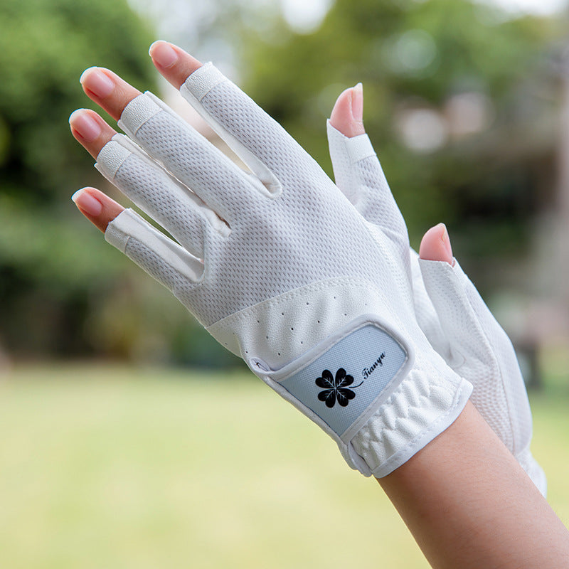 Women's golf gloves UK — White breathable non-slip open finger grip gloves on hands.