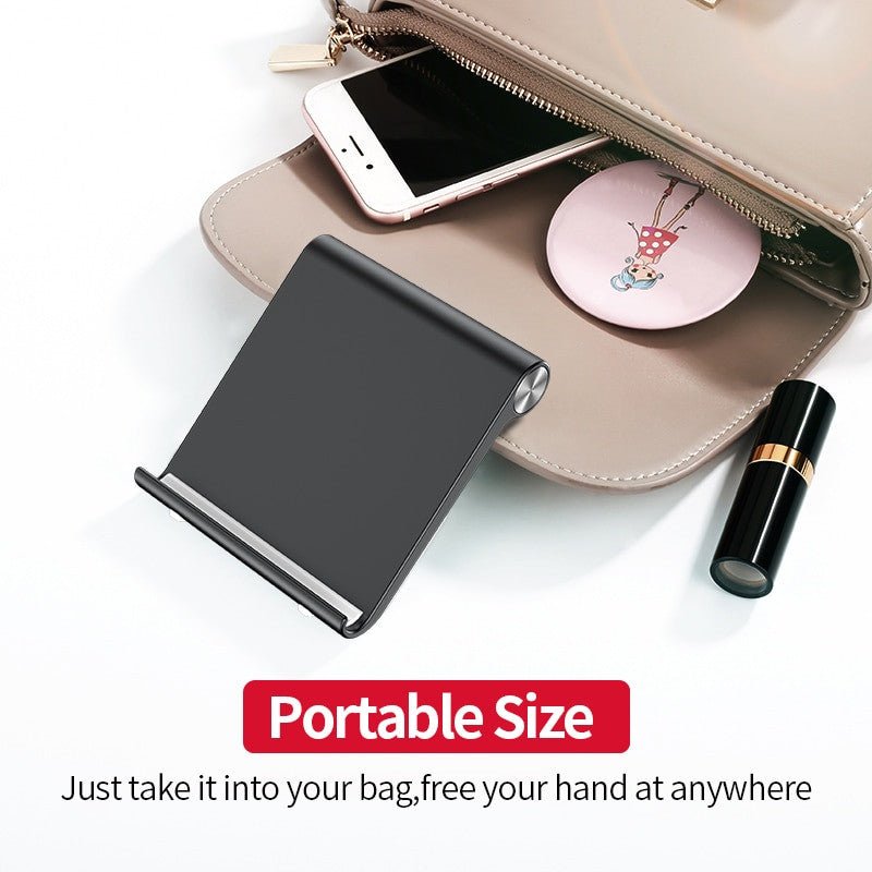 Olaf foldable desktop mobile phone holder stand in portable size shown with an iPhone, stylishly fitting alongside everyday essentials in a handbag.