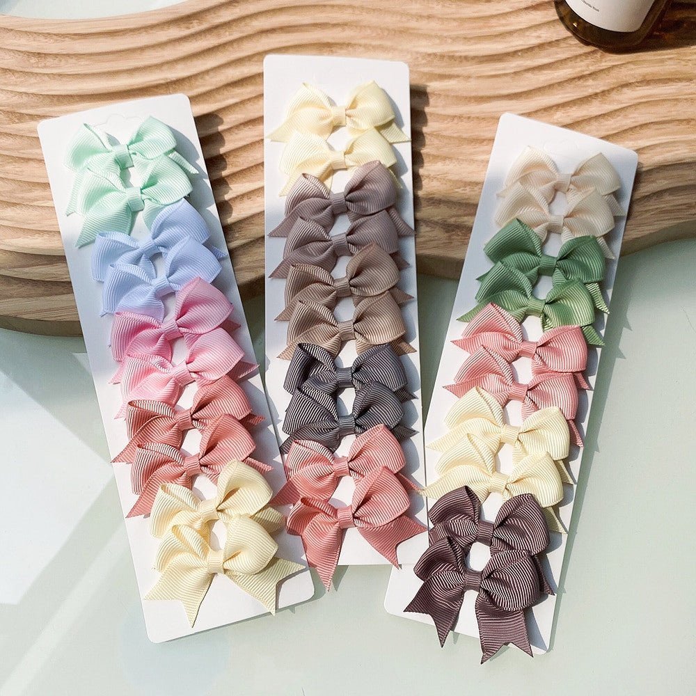 10Pcs/Set New Handmade Solid Ribbon Bowknot Hair Clips For Baby Girls.