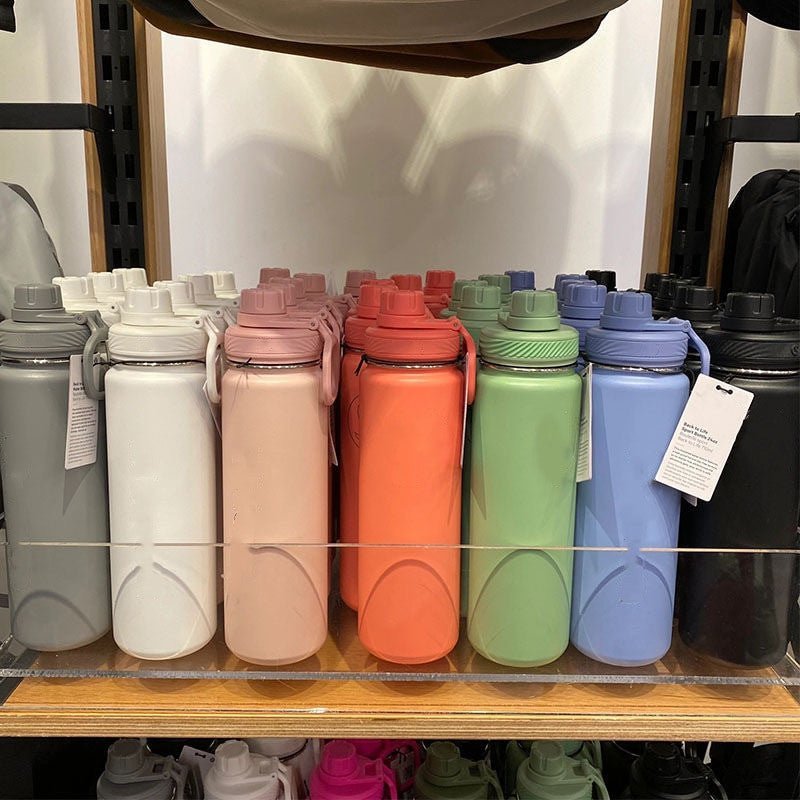 Multicoloured insulated water cup, sports bottles.